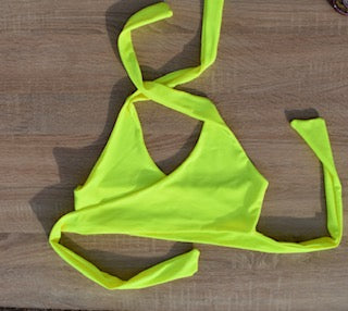 Peto cruzado amarillo fluor